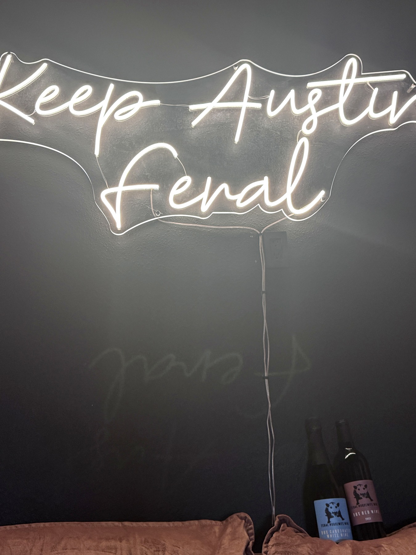 Keep Austin Feral neon sign in the tasting room