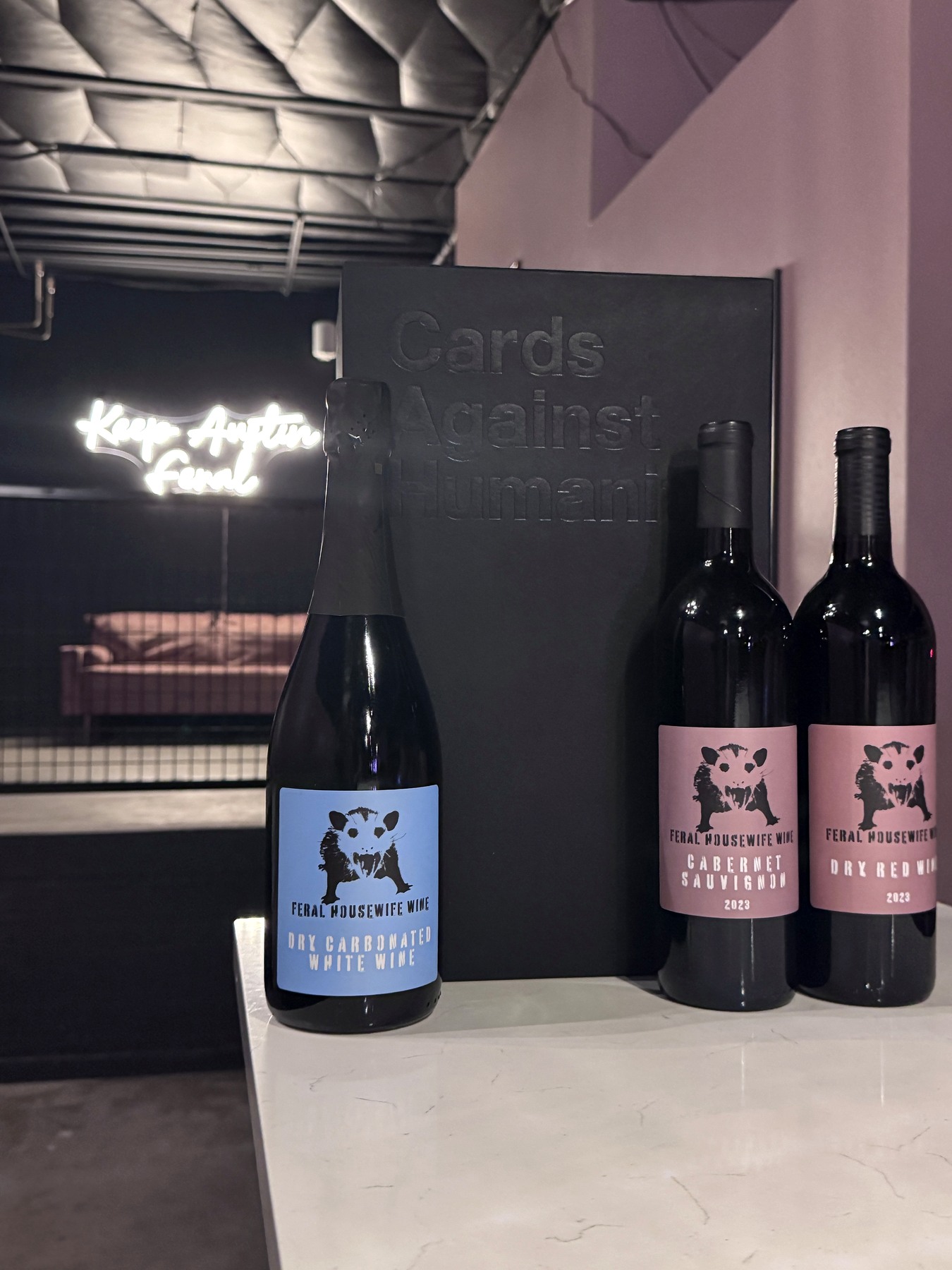 Feral Housewife Wine bottles in the tasting room